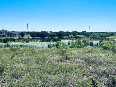 Nestled in the serene surroundings of the Hideout Golf Course on Hideout Golf Club and Resort  in Texas - for sale on GolfHomes.com, golf home, golf lot