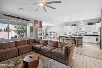 This single-story home in the gated Omni Tucson National resort on Omni Tucson National Golf Resort and Spa - Sonoran in Arizona - for sale on GolfHomes.com, golf home, golf lot