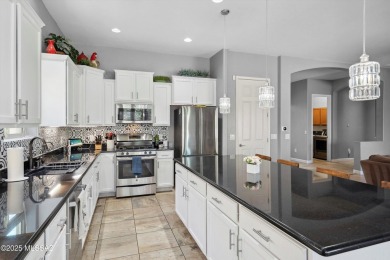 This single-story home in the gated Omni Tucson National resort on Omni Tucson National Golf Resort and Spa - Sonoran in Arizona - for sale on GolfHomes.com, golf home, golf lot