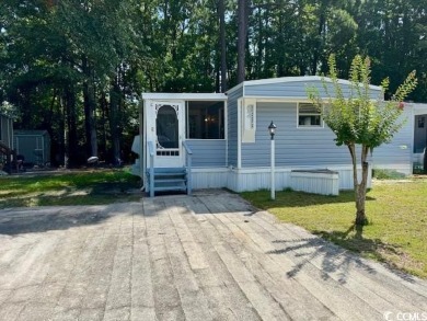 Looking for an affordable beach getaway or primary residence on Indian Wells Golf Course in South Carolina - for sale on GolfHomes.com, golf home, golf lot