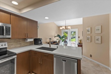This stunning townhome tucked away in a cul-de-sac in Spanish on Spanish Trail Golf and Country Club in Nevada - for sale on GolfHomes.com, golf home, golf lot