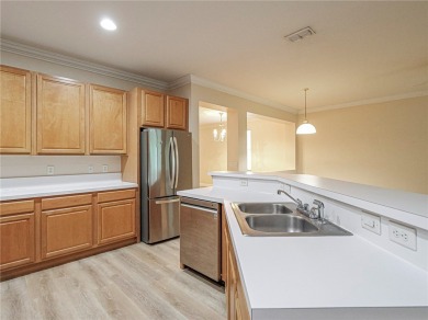 Located in Pointe West's central village, this 3 bedroom 2 bath on The Club At Pointe West in Florida - for sale on GolfHomes.com, golf home, golf lot