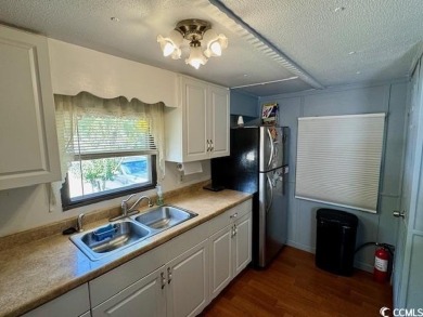 Looking for an affordable beach getaway or primary residence on Indian Wells Golf Course in South Carolina - for sale on GolfHomes.com, golf home, golf lot