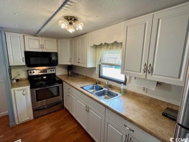 Looking for an affordable beach getaway or primary residence on Indian Wells Golf Course in South Carolina - for sale on GolfHomes.com, golf home, golf lot