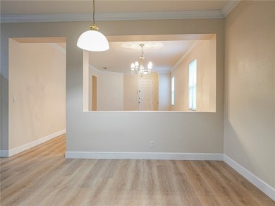 Located in Pointe West's central village, this 3 bedroom 2 bath on The Club At Pointe West in Florida - for sale on GolfHomes.com, golf home, golf lot