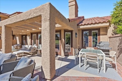This stunning townhome tucked away in a cul-de-sac in Spanish on Spanish Trail Golf and Country Club in Nevada - for sale on GolfHomes.com, golf home, golf lot
