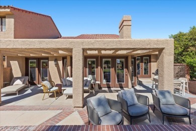 This stunning townhome tucked away in a cul-de-sac in Spanish on Spanish Trail Golf and Country Club in Nevada - for sale on GolfHomes.com, golf home, golf lot