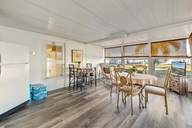 Welcome to this beautiful and spacious home in Tamiami Village on Six Lakes Country Club in Florida - for sale on GolfHomes.com, golf home, golf lot