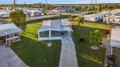 Welcome to this beautiful and spacious home in Tamiami Village on Six Lakes Country Club in Florida - for sale on GolfHomes.com, golf home, golf lot