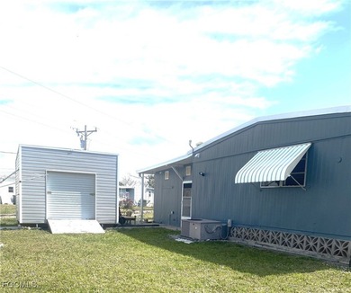 Welcome to this beautiful and spacious home in Tamiami Village on Six Lakes Country Club in Florida - for sale on GolfHomes.com, golf home, golf lot