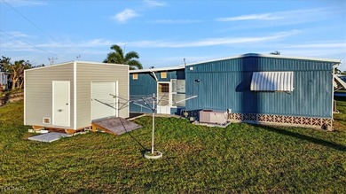 Welcome to this beautiful and spacious home in Tamiami Village on Six Lakes Country Club in Florida - for sale on GolfHomes.com, golf home, golf lot