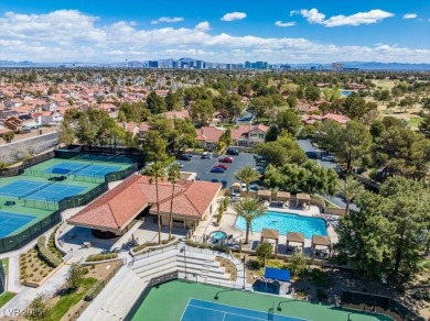 This stunning townhome tucked away in a cul-de-sac in Spanish on Spanish Trail Golf and Country Club in Nevada - for sale on GolfHomes.com, golf home, golf lot