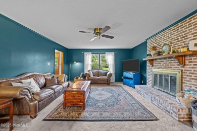 Welcome to this spacious 4-bedroom, 2-bath home in the on Harbour Point Golf Club in North Carolina - for sale on GolfHomes.com, golf home, golf lot