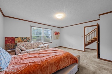 Welcome to this spacious 4-bedroom, 2-bath home in the on Harbour Point Golf Club in North Carolina - for sale on GolfHomes.com, golf home, golf lot