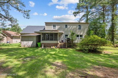 Welcome to this spacious 4-bedroom, 2-bath home in the on Harbour Point Golf Club in North Carolina - for sale on GolfHomes.com, golf home, golf lot