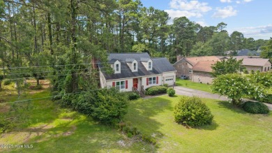 Welcome to this spacious 4-bedroom, 2-bath home in the on Harbour Point Golf Club in North Carolina - for sale on GolfHomes.com, golf home, golf lot