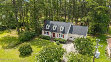 Welcome to this spacious 4-bedroom, 2-bath home in the on Harbour Point Golf Club in North Carolina - for sale on GolfHomes.com, golf home, golf lot