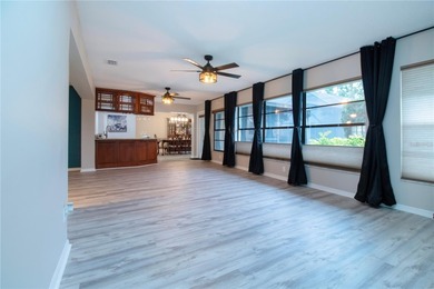 Under contract-accepting backup offers. Live the Florida dream on Sandpiper Golf Club in Florida - for sale on GolfHomes.com, golf home, golf lot