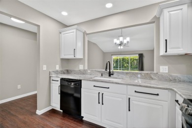 BEAUTIFULLY RENOVATED 3/2 WISTERIA MODEL with NEW ROOF (2025) on The Links of Spruce Creek in Florida - for sale on GolfHomes.com, golf home, golf lot