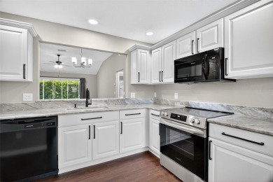 BEAUTIFULLY RENOVATED 3/2 WISTERIA MODEL with NEW ROOF (2025) on The Links of Spruce Creek in Florida - for sale on GolfHomes.com, golf home, golf lot