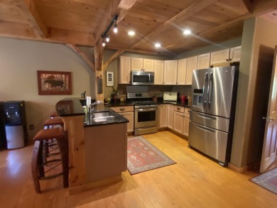 Remarkable 4 bedroom plus loft, 3 bath three-level post and beam on Mount Snow Golf Club in Vermont - for sale on GolfHomes.com, golf home, golf lot