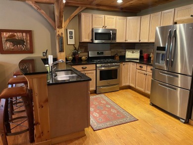 Remarkable 4 bedroom plus loft, 3 bath three-level post and beam on Mount Snow Golf Club in Vermont - for sale on GolfHomes.com, golf home, golf lot