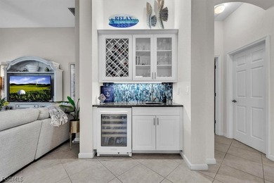 A meticulously maintained and upgraded home is now available for on Verandah Golf Course and Club in Florida - for sale on GolfHomes.com, golf home, golf lot