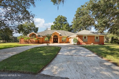 Beautifully updated all-brick 4BR/3BA home on a quiet cul-de-sac on Magnolia Point Golf and Country Club in Florida - for sale on GolfHomes.com, golf home, golf lot