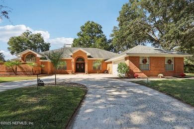 Beautifully updated all-brick 4BR/3BA home on a quiet cul-de-sac on Magnolia Point Golf and Country Club in Florida - for sale on GolfHomes.com, golf home, golf lot
