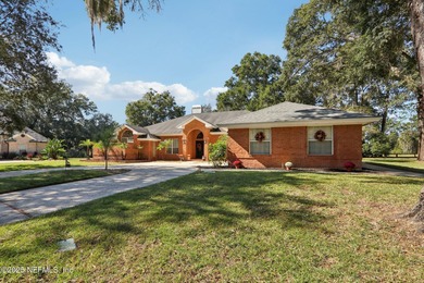 Beautifully updated all-brick 4BR/3BA home on a quiet cul-de-sac on Magnolia Point Golf and Country Club in Florida - for sale on GolfHomes.com, golf home, golf lot