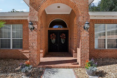 Beautifully updated all-brick 4BR/3BA home on a quiet cul-de-sac on Magnolia Point Golf and Country Club in Florida - for sale on GolfHomes.com, golf home, golf lot