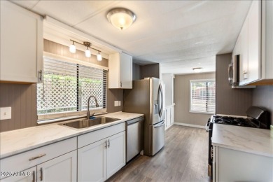 Charming 3-bedroom, 2-bath home located in the highly on Sun Lakes Country Club in Arizona - for sale on GolfHomes.com, golf home, golf lot