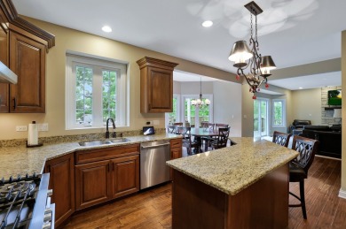 Custom home with 4 spacious bedrooms, 4.5 bathrooms nestled on on Blackstone Golf Club in Illinois - for sale on GolfHomes.com, golf home, golf lot