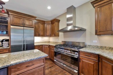 Custom home with 4 spacious bedrooms, 4.5 bathrooms nestled on on Blackstone Golf Club in Illinois - for sale on GolfHomes.com, golf home, golf lot