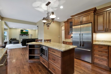 Custom home with 4 spacious bedrooms, 4.5 bathrooms nestled on on Blackstone Golf Club in Illinois - for sale on GolfHomes.com, golf home, golf lot
