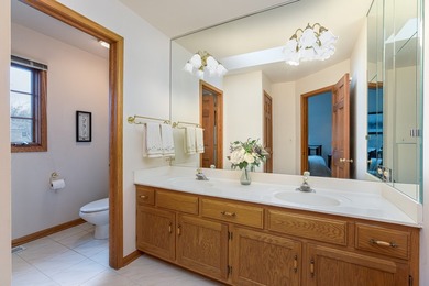 This well-maintained home is perfectly positioned on a spacious on St. Andrews Golf and Country Club in Illinois - for sale on GolfHomes.com, golf home, golf lot