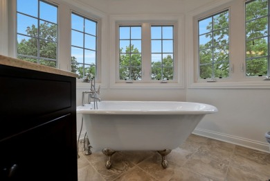 Custom home with 4 spacious bedrooms, 4.5 bathrooms nestled on on Blackstone Golf Club in Illinois - for sale on GolfHomes.com, golf home, golf lot