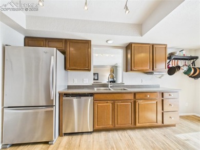 Spacious 2,028 sq ft Spanish Mediterranean-style townhome on Desert Hawk At Pueblo West in Colorado - for sale on GolfHomes.com, golf home, golf lot
