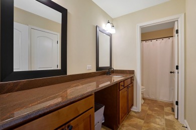 Custom home with 4 spacious bedrooms, 4.5 bathrooms nestled on on Blackstone Golf Club in Illinois - for sale on GolfHomes.com, golf home, golf lot