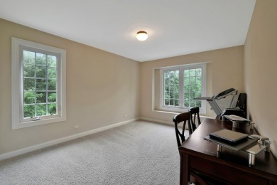 Custom home with 4 spacious bedrooms, 4.5 bathrooms nestled on on Blackstone Golf Club in Illinois - for sale on GolfHomes.com, golf home, golf lot