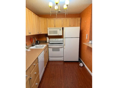 You will enjoy this 2nd floor, furnished 1 bedroom 1.5 bath unit on Hillsboro Pines Golf in Florida - for sale on GolfHomes.com, golf home, golf lot