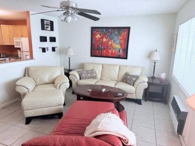 You will enjoy this 2nd floor, furnished 1 bedroom 1.5 bath unit on Hillsboro Pines Golf in Florida - for sale on GolfHomes.com, golf home, golf lot