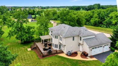 Custom home with 4 spacious bedrooms, 4.5 bathrooms nestled on on Blackstone Golf Club in Illinois - for sale on GolfHomes.com, golf home, golf lot