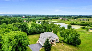 Custom home with 4 spacious bedrooms, 4.5 bathrooms nestled on on Blackstone Golf Club in Illinois - for sale on GolfHomes.com, golf home, golf lot