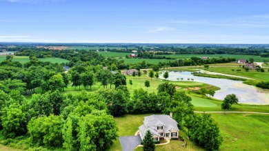 Custom home with 4 spacious bedrooms, 4.5 bathrooms nestled on on Blackstone Golf Club in Illinois - for sale on GolfHomes.com, golf home, golf lot