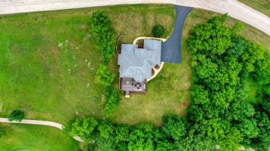Custom home with 4 spacious bedrooms, 4.5 bathrooms nestled on on Blackstone Golf Club in Illinois - for sale on GolfHomes.com, golf home, golf lot