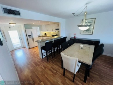 This fully renovated one-bedroom condo offers stylish comfort on Sunrise Lakes Phase III in Florida - for sale on GolfHomes.com, golf home, golf lot