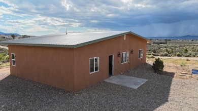 Recently completed house; have received the Certificate of on Taos Country Club in New Mexico - for sale on GolfHomes.com, golf home, golf lot