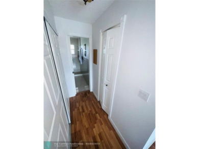 This fully renovated one-bedroom condo offers stylish comfort on Sunrise Lakes Phase III in Florida - for sale on GolfHomes.com, golf home, golf lot