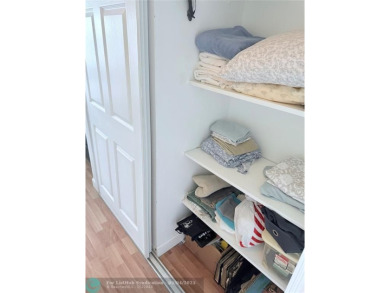 This fully renovated one-bedroom condo offers stylish comfort on Sunrise Lakes Phase III in Florida - for sale on GolfHomes.com, golf home, golf lot